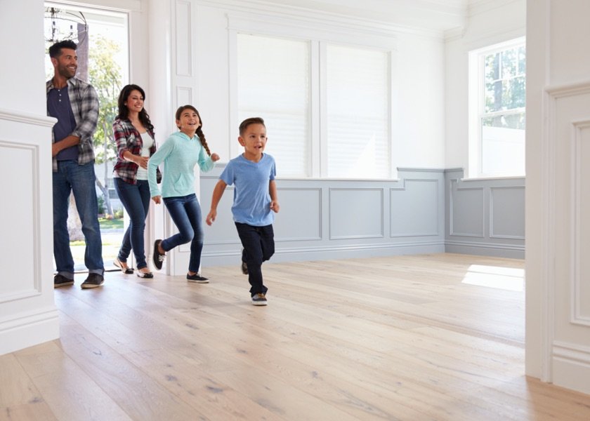 family entering new home